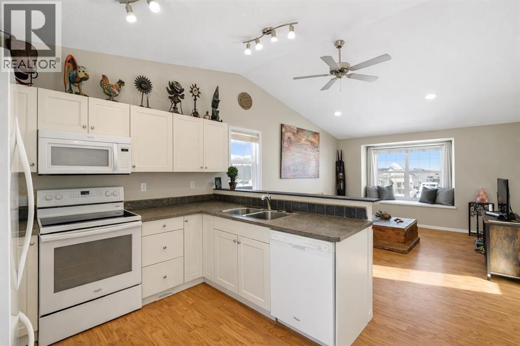 57 Garden Road, Lacombe, AB - Indoor Photo Showing Kitchen With Double Sink