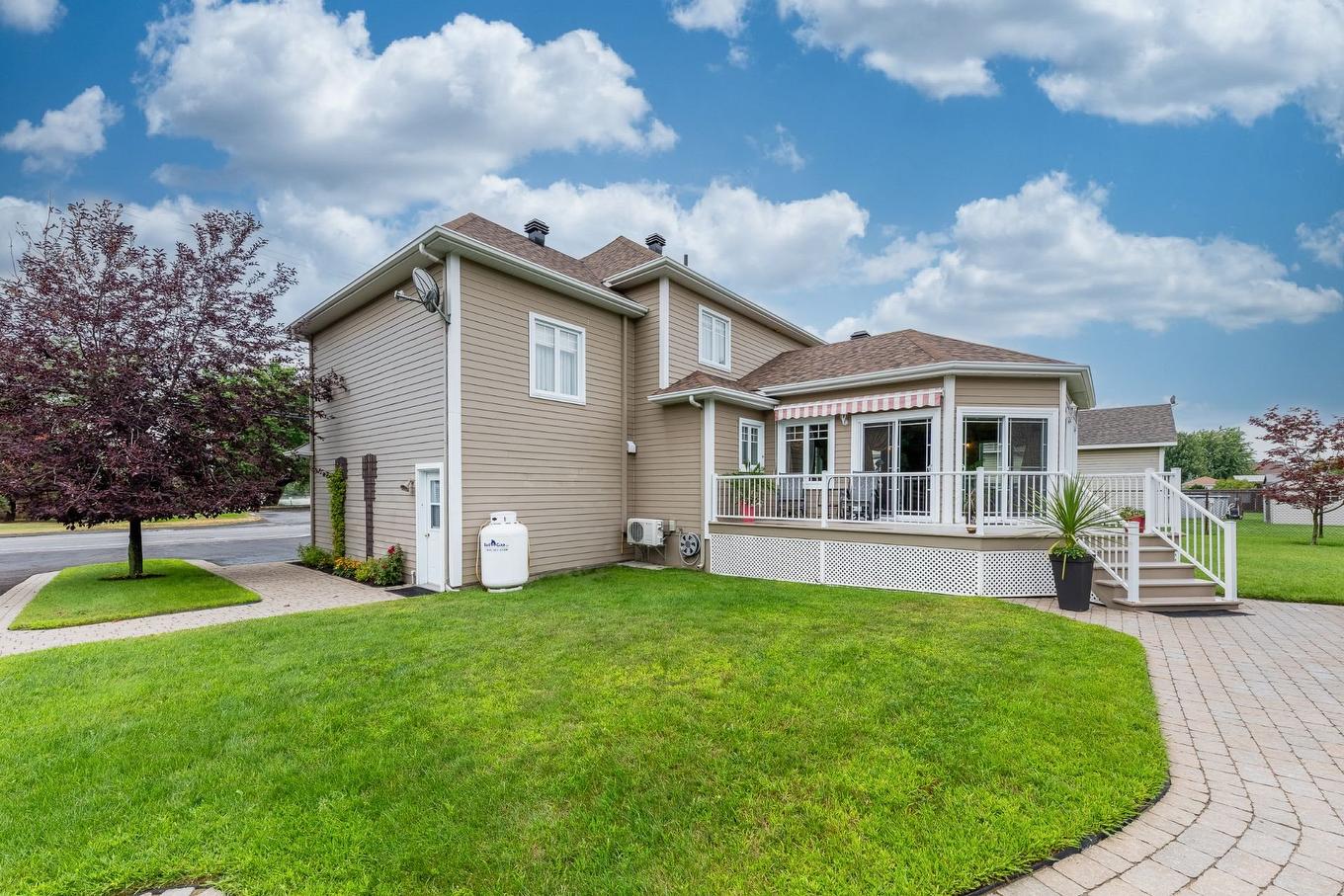 Back facade - 24 Ch. Des Patriotes E., Saint-Jean-Sur-Richelieu, QC - Outdoor With Deck Patio Veranda