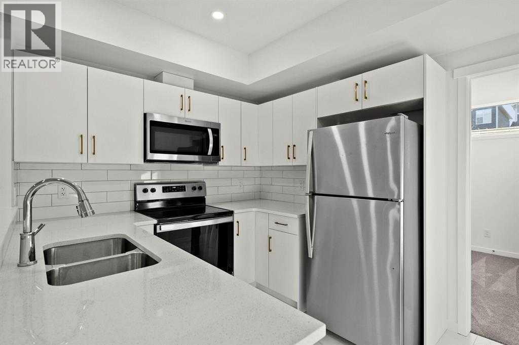 640 Masters Road Se, Calgary, AB - Indoor Photo Showing Kitchen With Stainless Steel Kitchen With Double Sink With Upgraded Kitchen