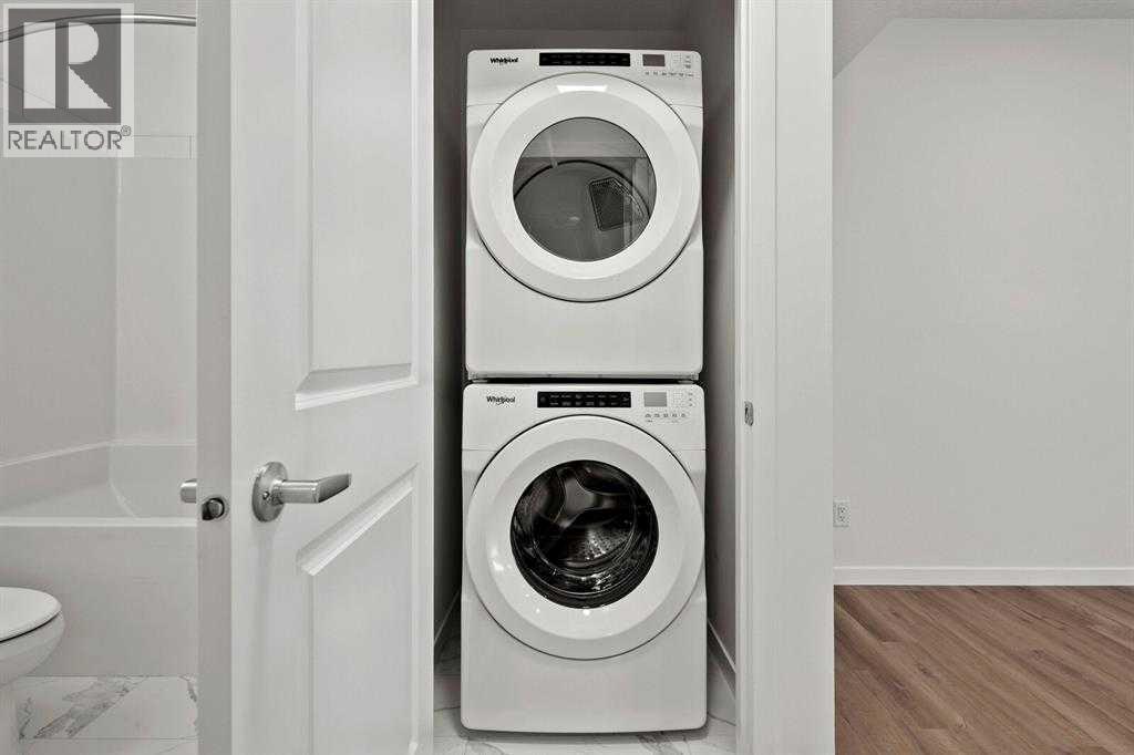 640 Masters Road Se, Calgary, AB - Indoor Photo Showing Laundry Room