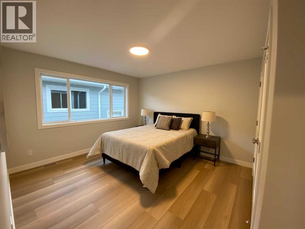 4213 57 Street, Taber, AB - Indoor Photo Showing Bedroom