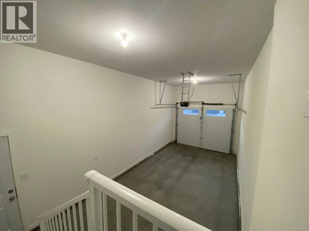 4213 57 Street, Taber, AB - Indoor Photo Showing Garage