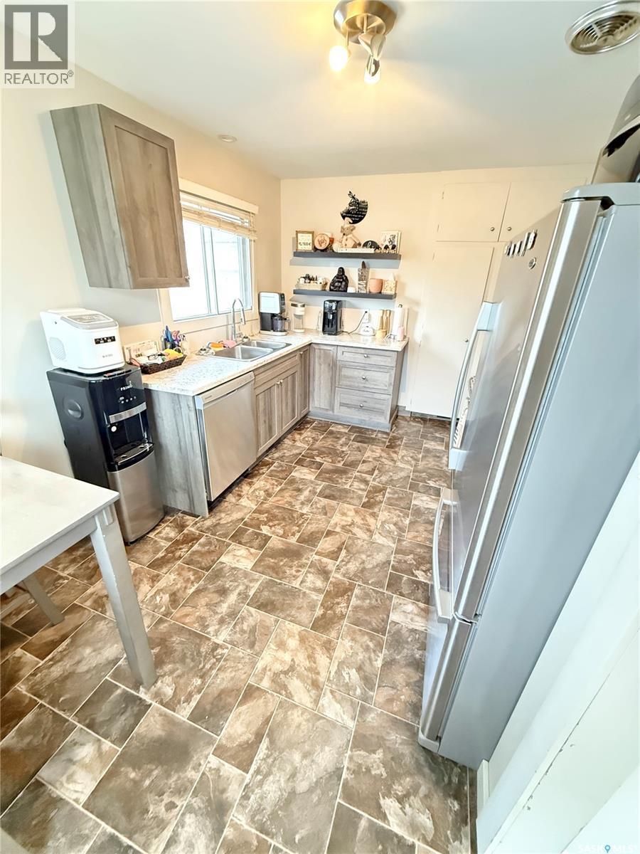 223 4Th Street, Weyburn, SK - Indoor Photo Showing Kitchen With Double Sink