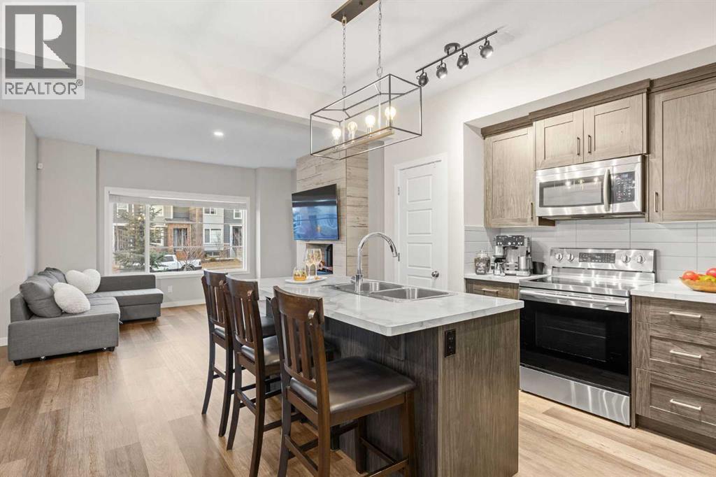 1027 Lanark Boulevard Se, Airdrie, AB - Indoor Photo Showing Kitchen With Double Sink