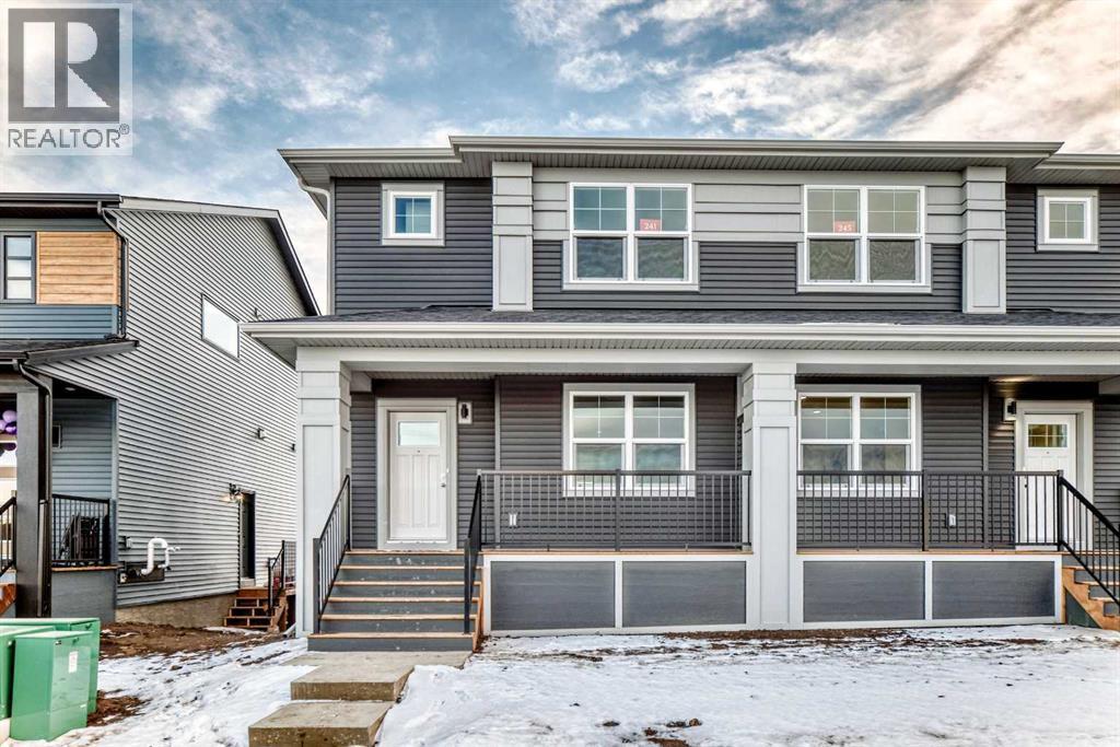 241 Bridgeport Gate, Chestermere, AB - Outdoor With Facade