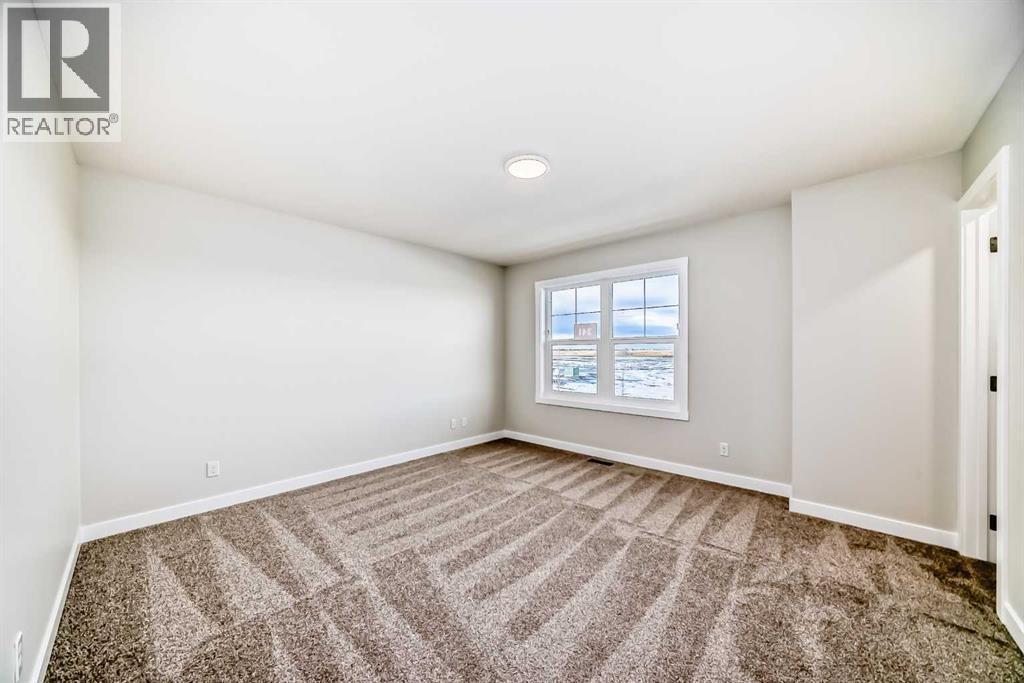 241 Bridgeport Gate, Chestermere, AB - Indoor Photo Showing Other Room