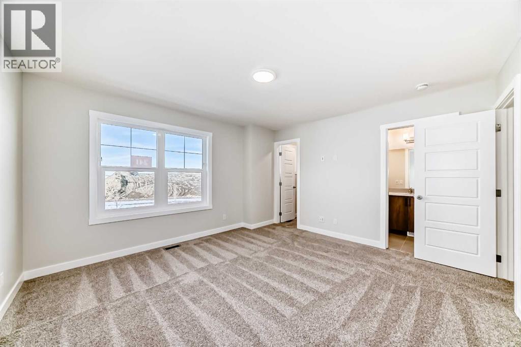 241 Bridgeport Gate, Chestermere, AB - Indoor Photo Showing Other Room