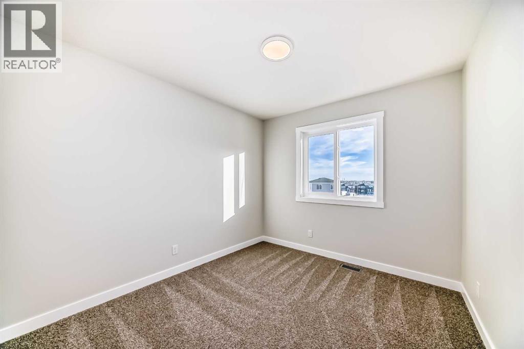 241 Bridgeport Gate, Chestermere, AB - Indoor Photo Showing Other Room