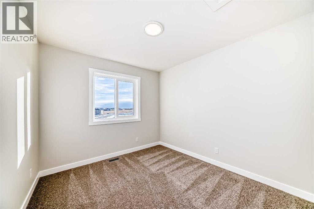241 Bridgeport Gate, Chestermere, AB - Indoor Photo Showing Other Room