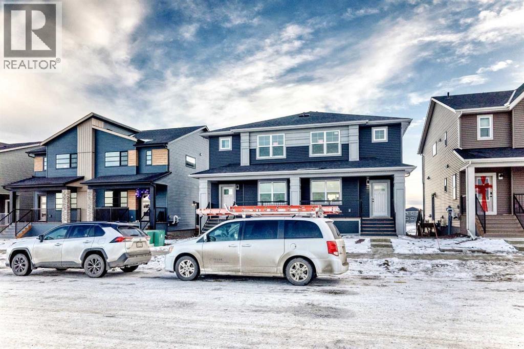 241 Bridgeport Gate, Chestermere, AB - Outdoor With Facade