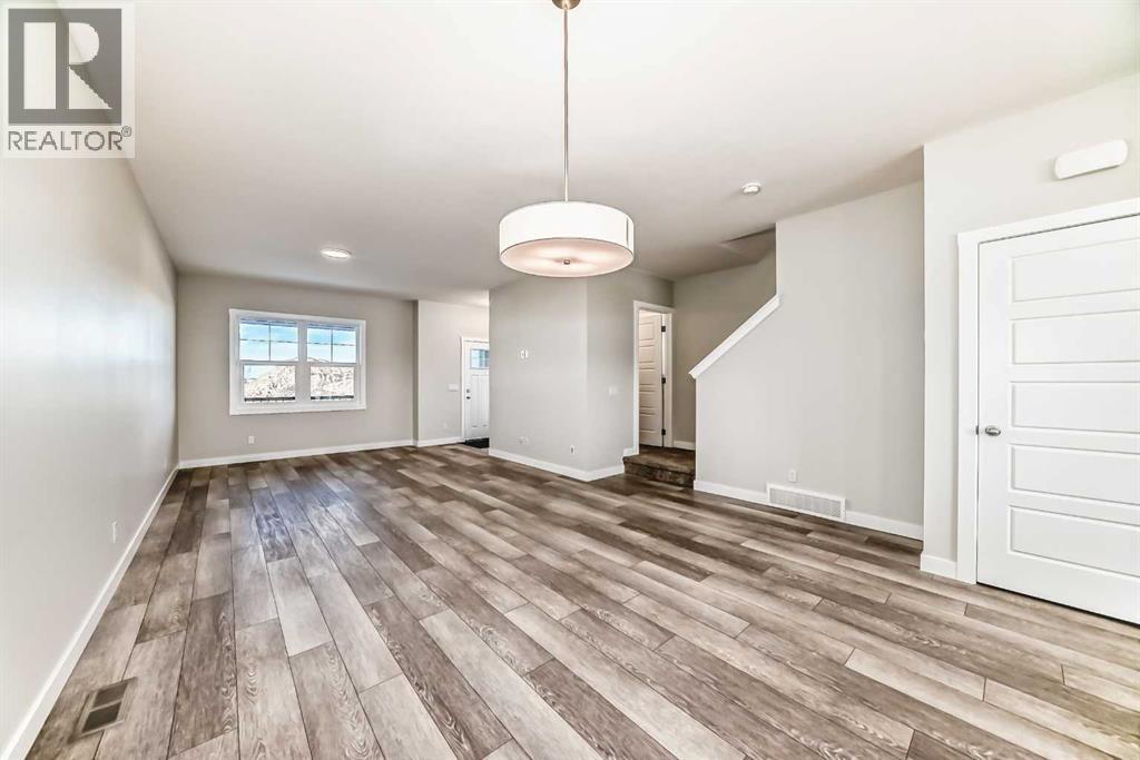 241 Bridgeport Gate, Chestermere, AB - Indoor Photo Showing Other Room