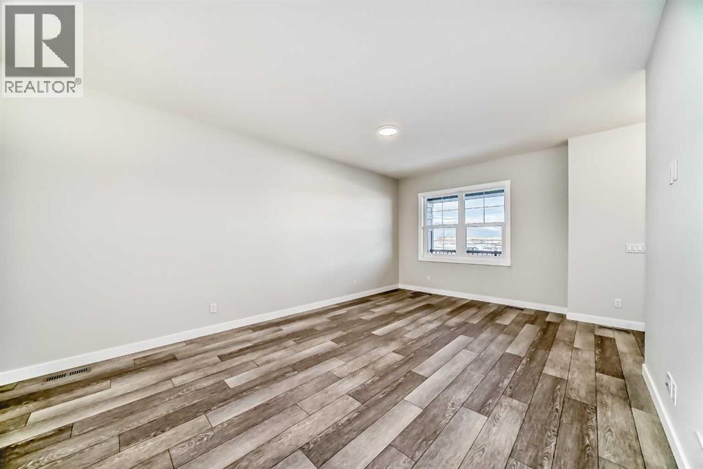 241 Bridgeport Gate, Chestermere, AB - Indoor Photo Showing Other Room