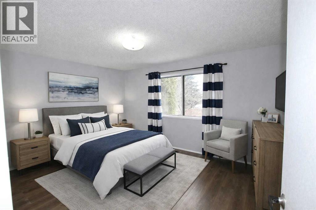 virtually staged - 97 Cunningham Crescent, Red Deer, AB - Indoor Photo Showing Bedroom