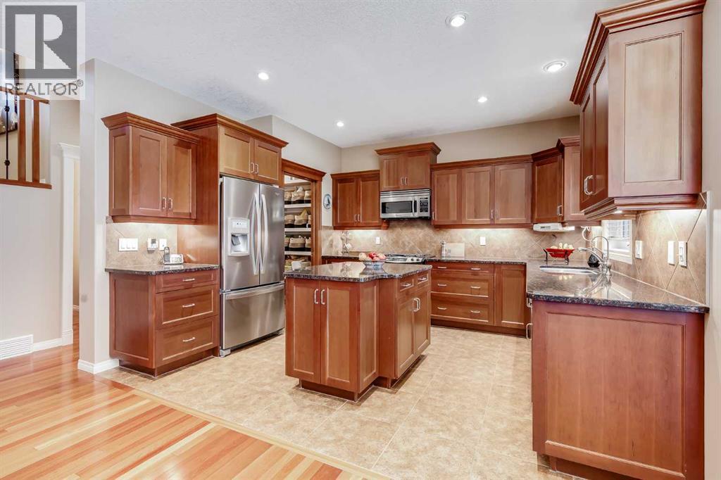 47 Tuscany Estates Close Nw, Calgary, AB - Indoor Photo Showing Kitchen With Stainless Steel Kitchen