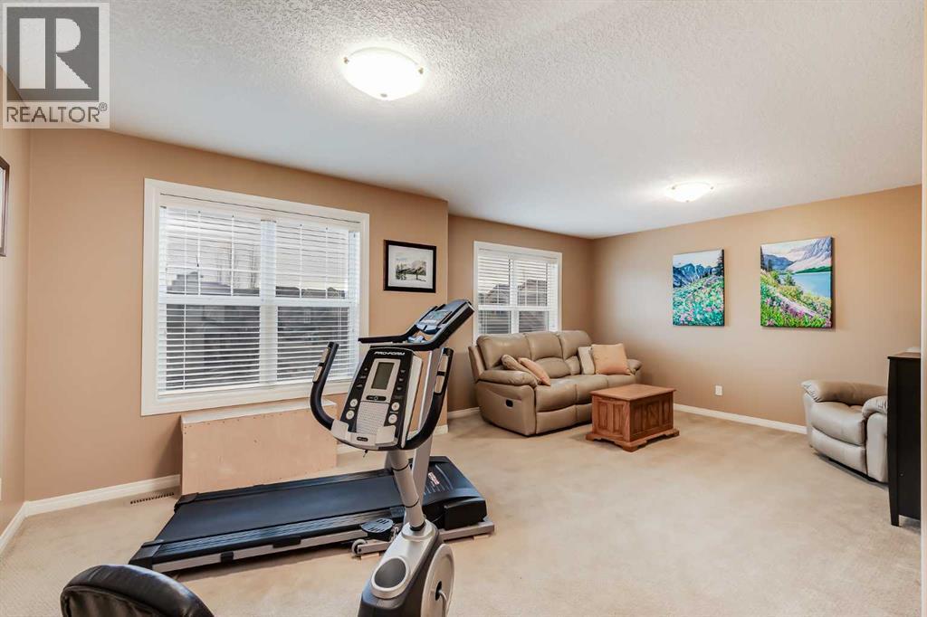 47 Tuscany Estates Close Nw, Calgary, AB - Indoor Photo Showing Gym Room