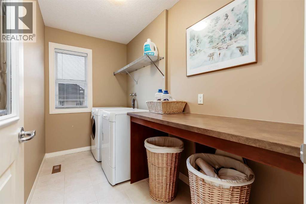 47 Tuscany Estates Close Nw, Calgary, AB - Indoor Photo Showing Laundry Room