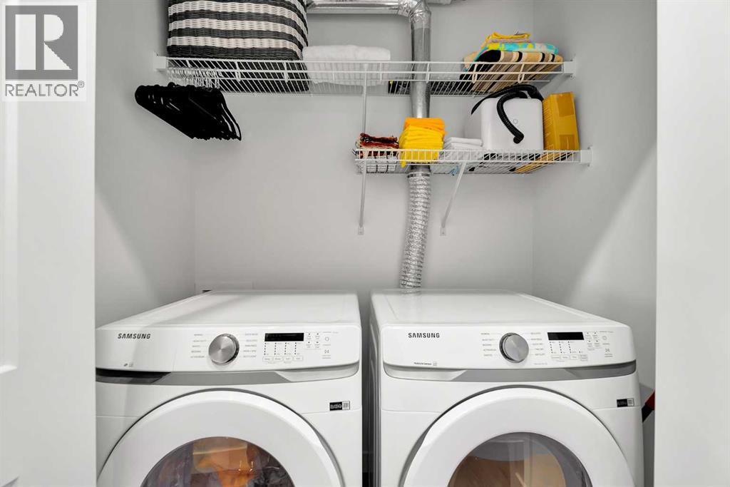 2216, 200 Seton Circle Se, Calgary, AB - Indoor Photo Showing Laundry Room