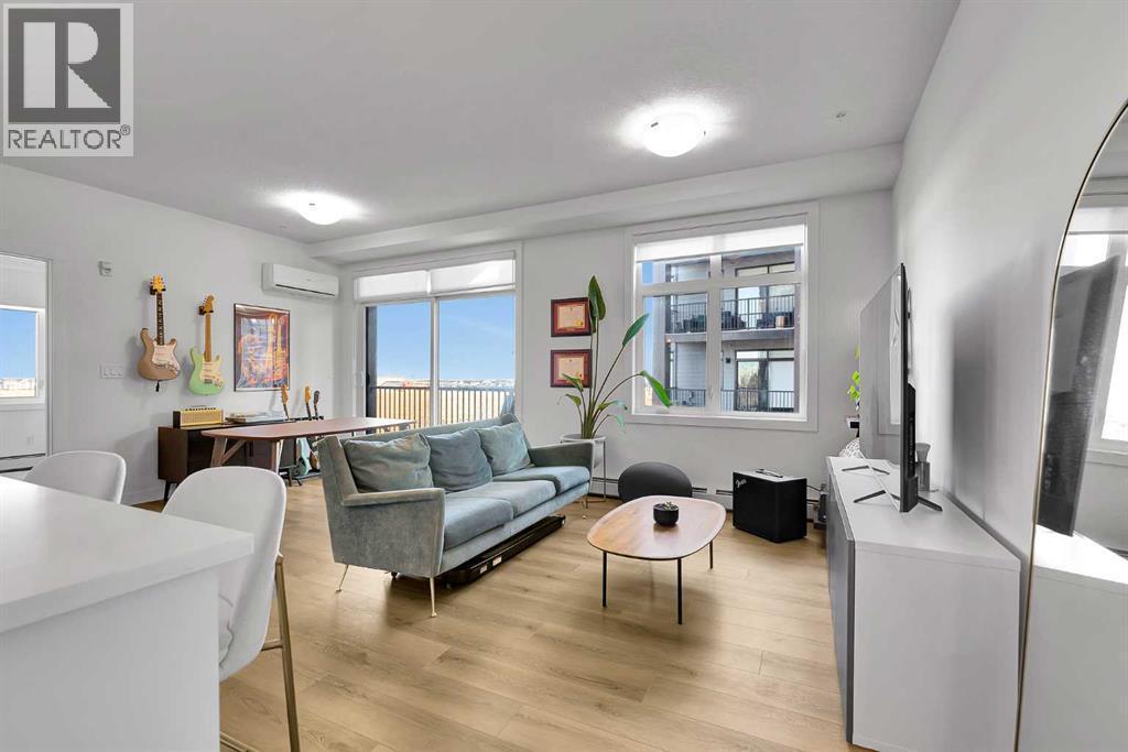 2216, 200 Seton Circle Se, Calgary, AB - Indoor Photo Showing Living Room