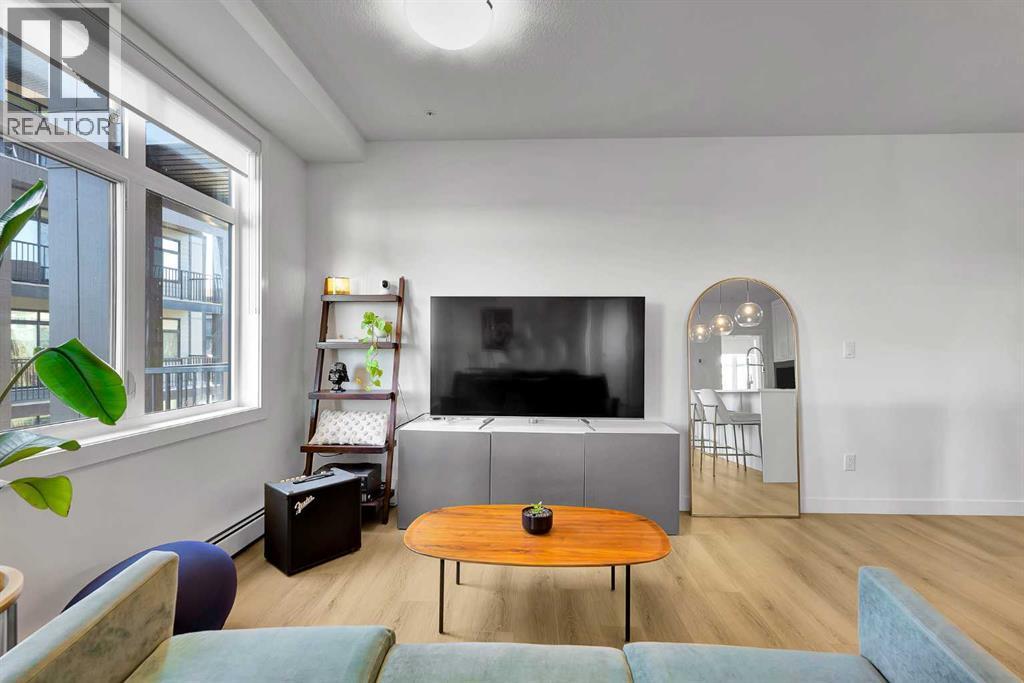 2216, 200 Seton Circle Se, Calgary, AB - Indoor Photo Showing Living Room