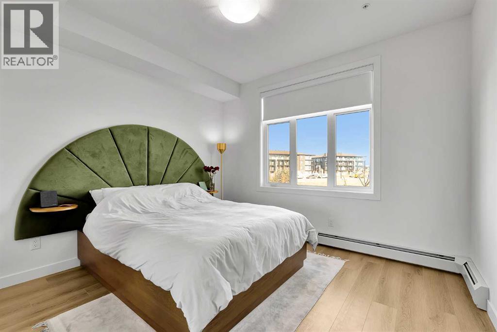 2216, 200 Seton Circle Se, Calgary, AB - Indoor Photo Showing Bedroom