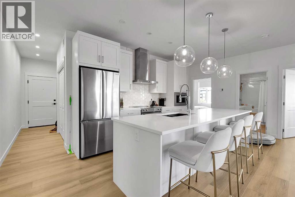 2216, 200 Seton Circle Se, Calgary, AB - Indoor Photo Showing Kitchen With Upgraded Kitchen