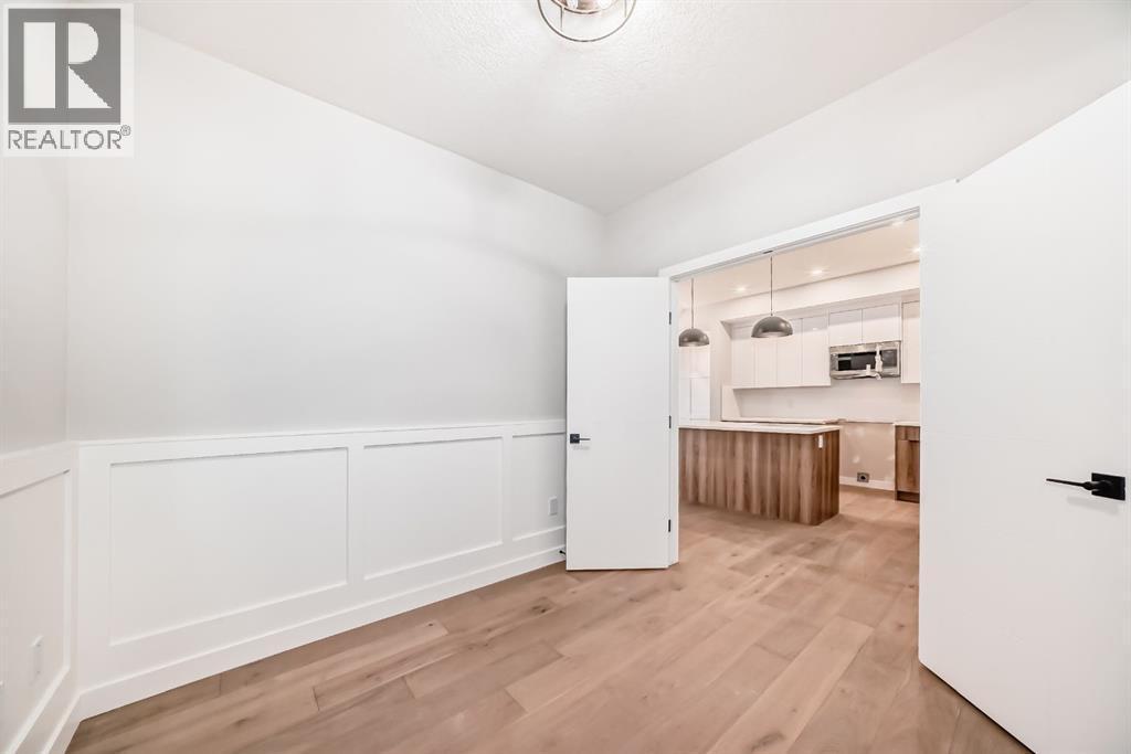 508 Heritage Boulevard, Cochrane, AB - Indoor Photo Showing Other Room