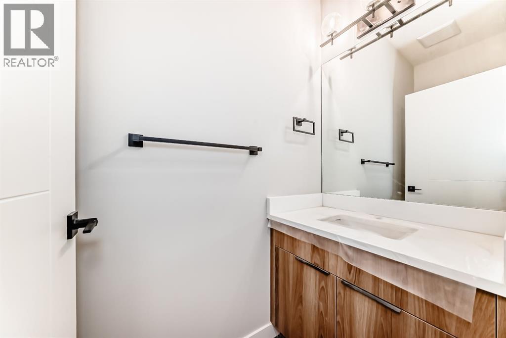 Powder Room - 508 Heritage Boulevard, Cochrane, AB - Indoor Photo Showing Bathroom