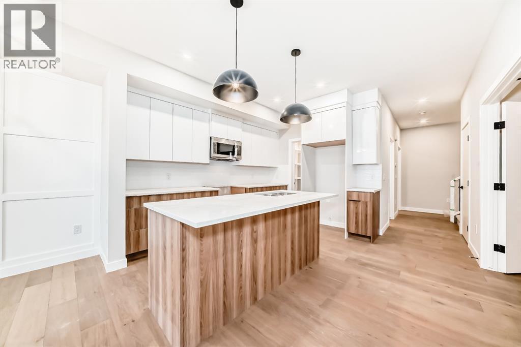 Modern Kitchen - 508 Heritage Boulevard, Cochrane, AB - Indoor Photo Showing Kitchen