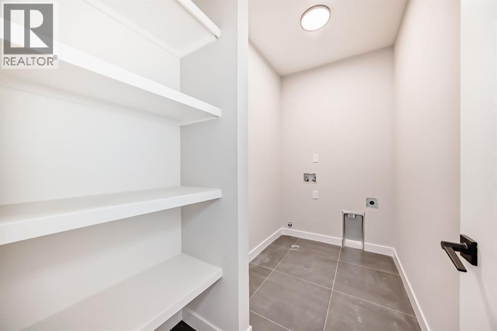 :aundry Room - 508 Heritage Boulevard, Cochrane, AB - Indoor