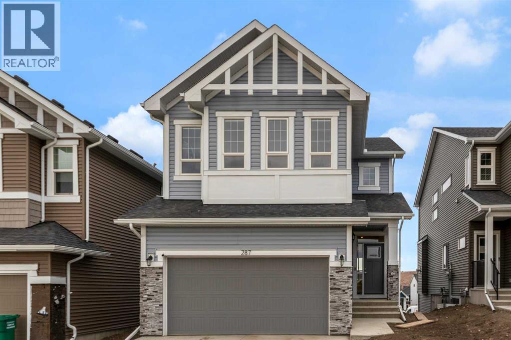 287 Rivercrest Boulevard, Cochrane, AB - Outdoor With Facade