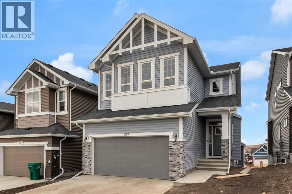287 Rivercrest Boulevard, Cochrane, AB - Outdoor With Facade