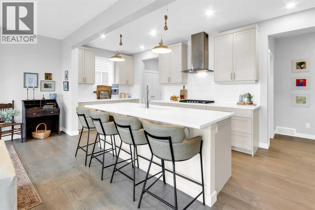 287 Rivercrest Boulevard, Cochrane, AB - Indoor Photo Showing Kitchen With Upgraded Kitchen