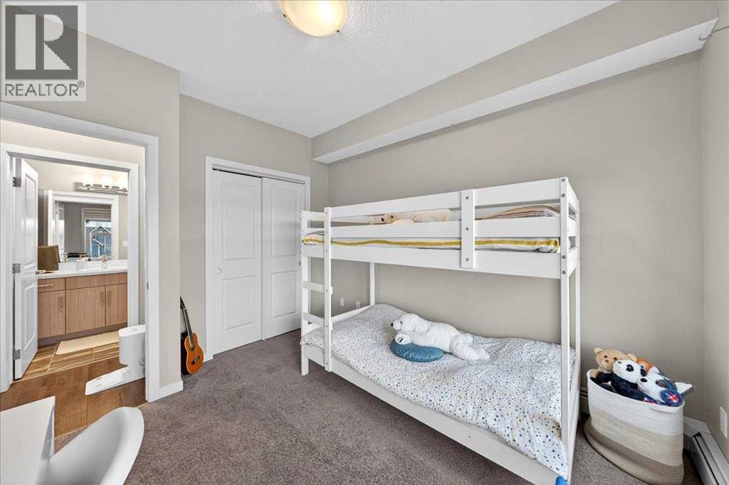302, 200 Cranfield Common Se, Calgary, AB - Indoor Photo Showing Bedroom