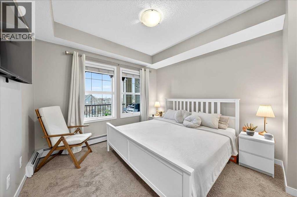 302, 200 Cranfield Common Se, Calgary, AB - Indoor Photo Showing Bedroom