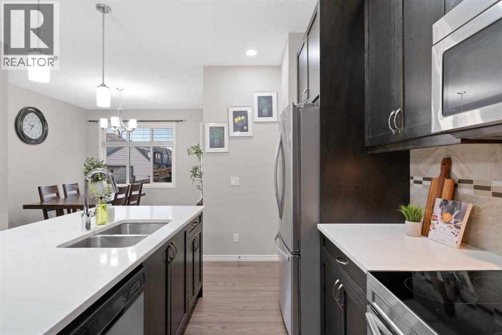 1529 Legacy Circle Se, Calgary, AB - Indoor Photo Showing Kitchen With Double Sink