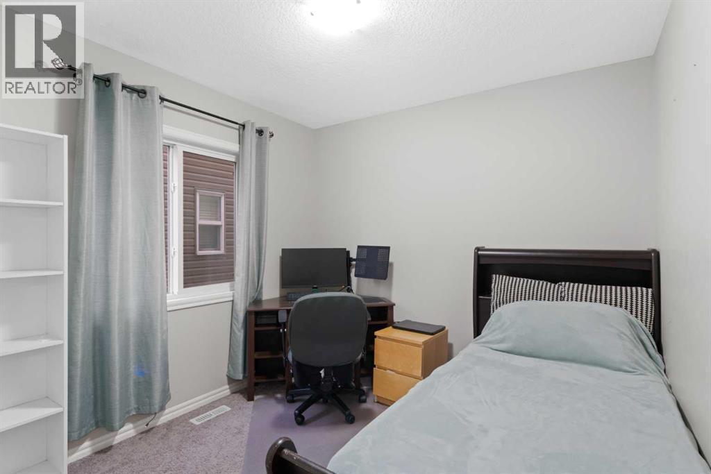 1529 Legacy Circle Se, Calgary, AB - Indoor Photo Showing Bedroom