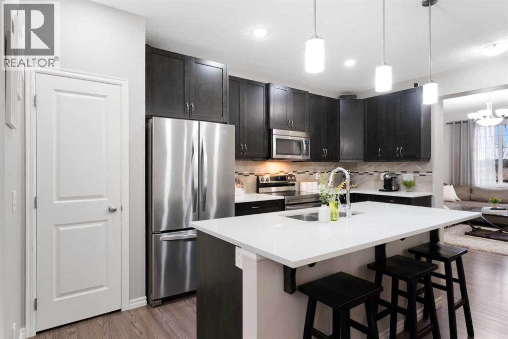 1529 Legacy Circle Se, Calgary, AB - Indoor Photo Showing Kitchen With Stainless Steel Kitchen With Upgraded Kitchen