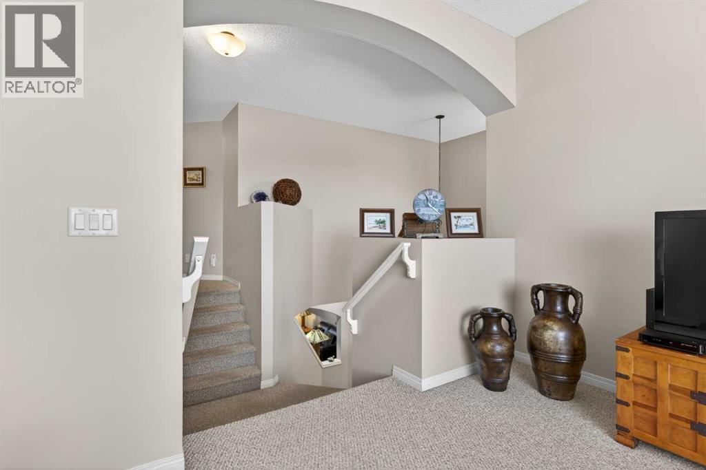 Family Room to Hallway - 627 Auburn Bay Heights Se, Calgary, AB - Indoor