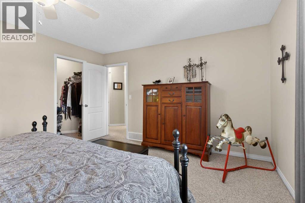 Primary Bedroom - 627 Auburn Bay Heights Se, Calgary, AB - Indoor Photo Showing Bedroom