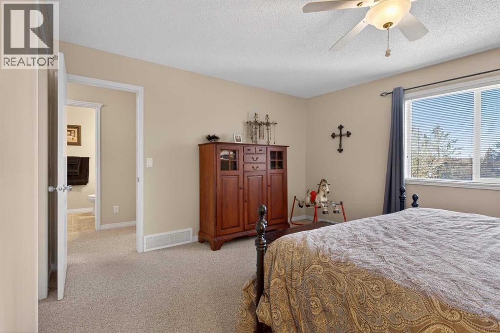 Primary Bedroom - 627 Auburn Bay Heights Se, Calgary, AB - Indoor Photo Showing Bedroom