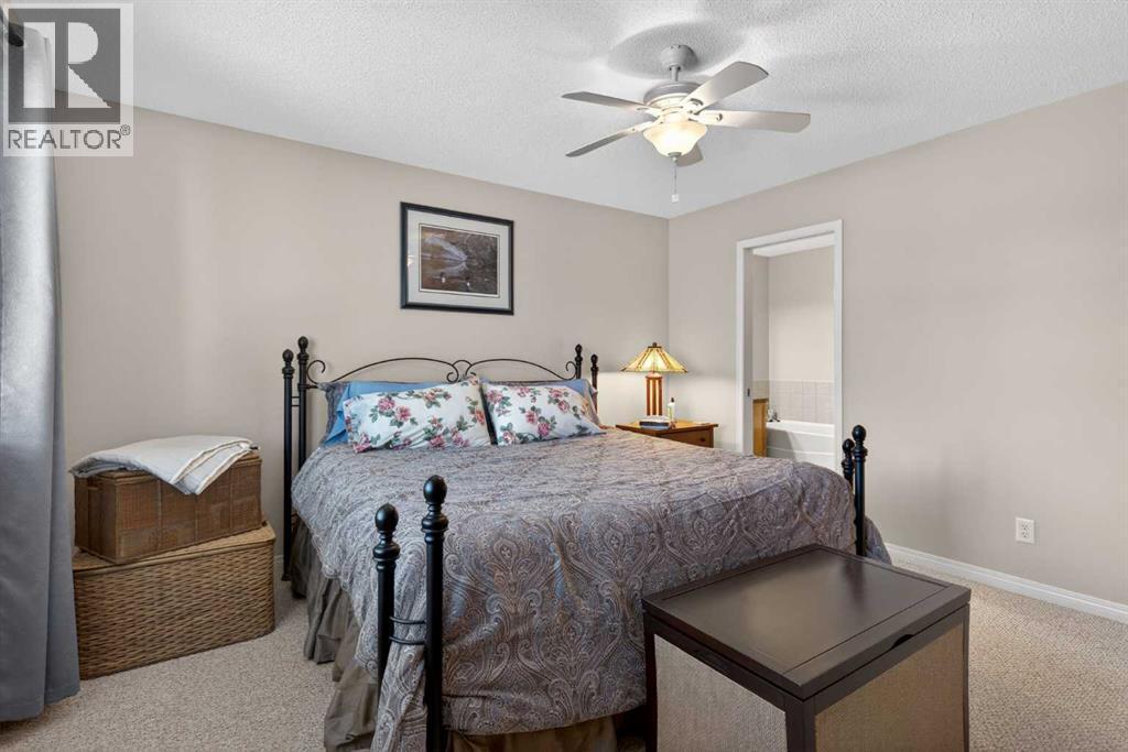 Primary Bedroom - 627 Auburn Bay Heights Se, Calgary, AB - Indoor Photo Showing Bedroom