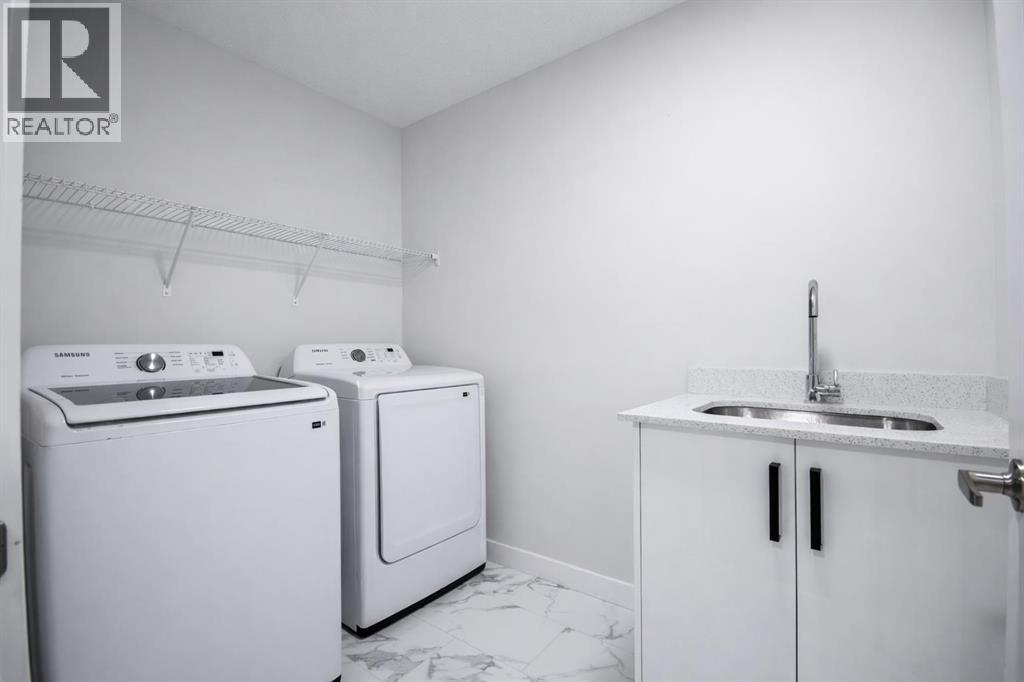 113 Corner Meadows Square Ne, Calgary, AB - Indoor Photo Showing Laundry Room