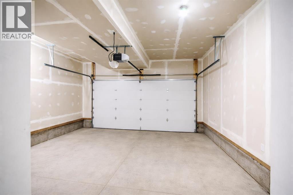 113 Corner Meadows Square Ne, Calgary, AB - Indoor Photo Showing Garage