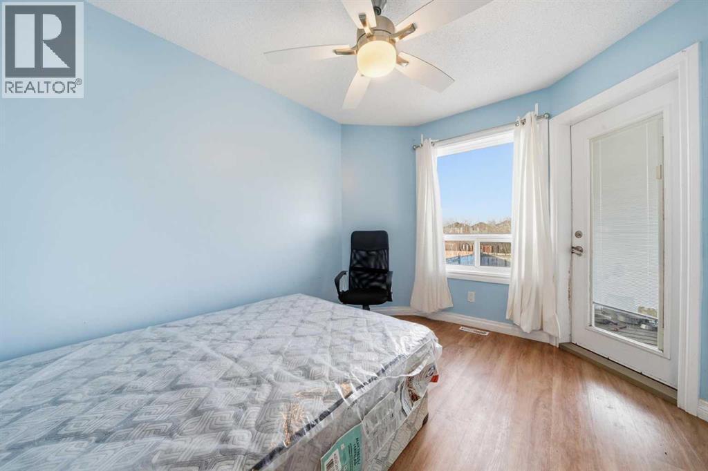 80 Taradale Drive S, Calgary, AB - Indoor Photo Showing Bedroom
