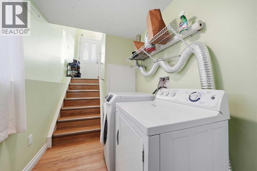 80 Taradale Drive S, Calgary, AB - Indoor Photo Showing Laundry Room