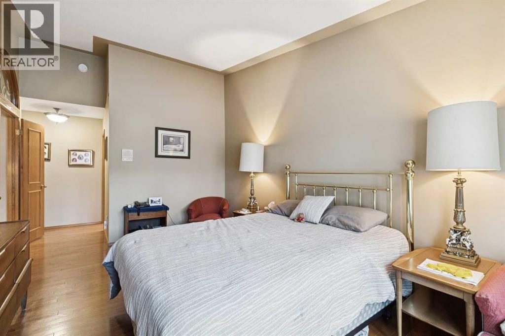 1025 Shawnee Road Sw, Calgary, AB - Indoor Photo Showing Bedroom