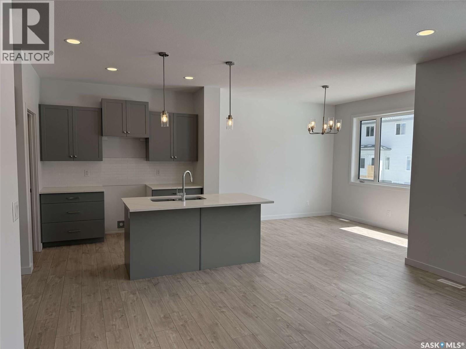 319 Cowessess Road, Saskatoon, SK - Indoor Photo Showing Kitchen With Upgraded Kitchen