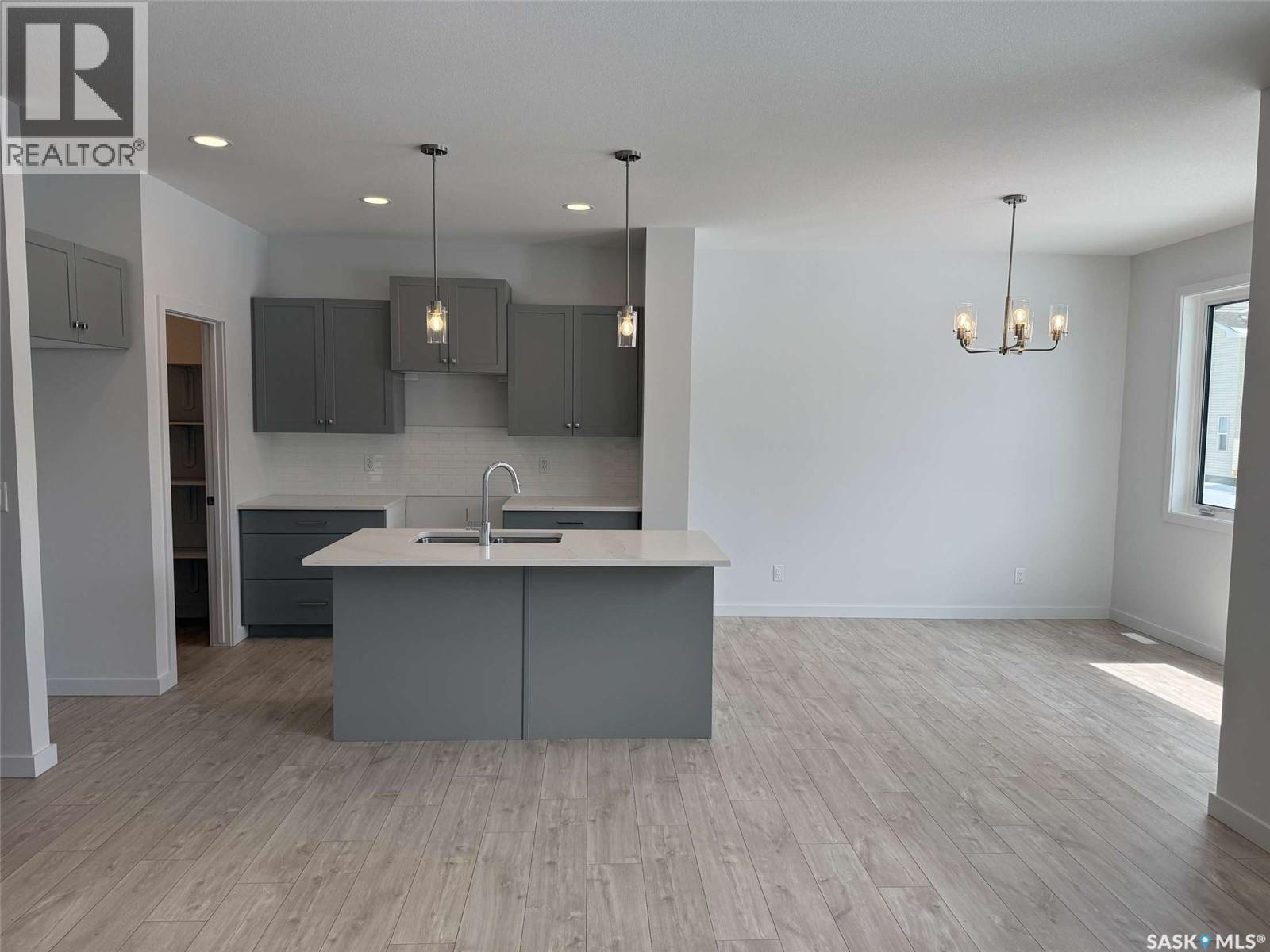 319 Cowessess Road, Saskatoon, SK - Indoor Photo Showing Kitchen With Upgraded Kitchen
