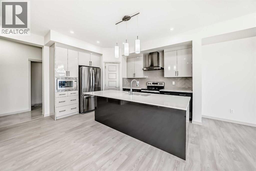 31 Lucas Passage Nw, Calgary, AB - Indoor Photo Showing Kitchen With Upgraded Kitchen