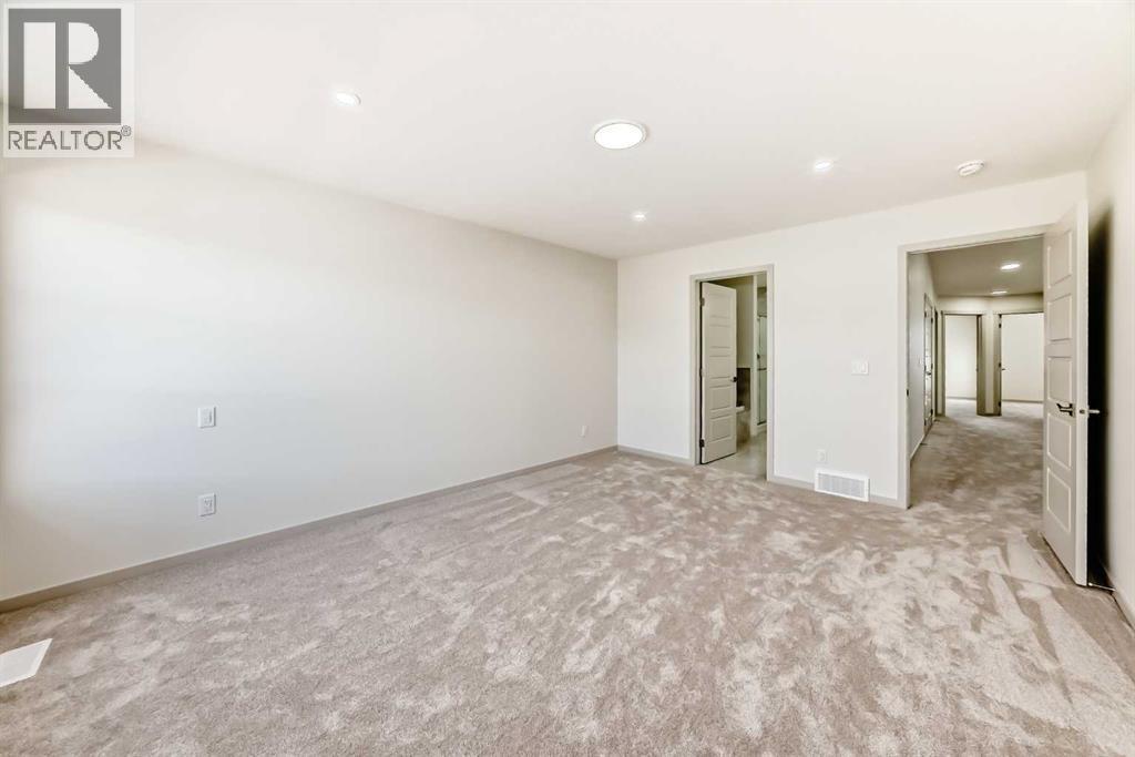 31 Lucas Passage Nw, Calgary, AB - Indoor Photo Showing Other Room